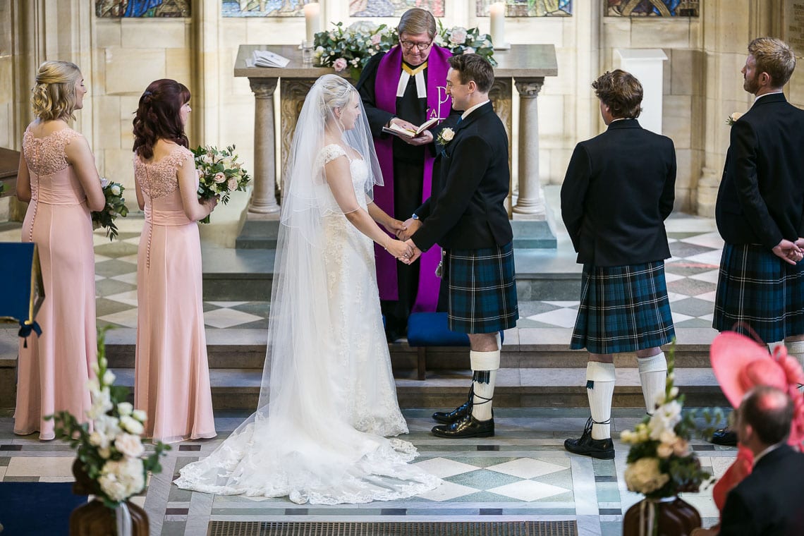 bride and groom exchange of rings