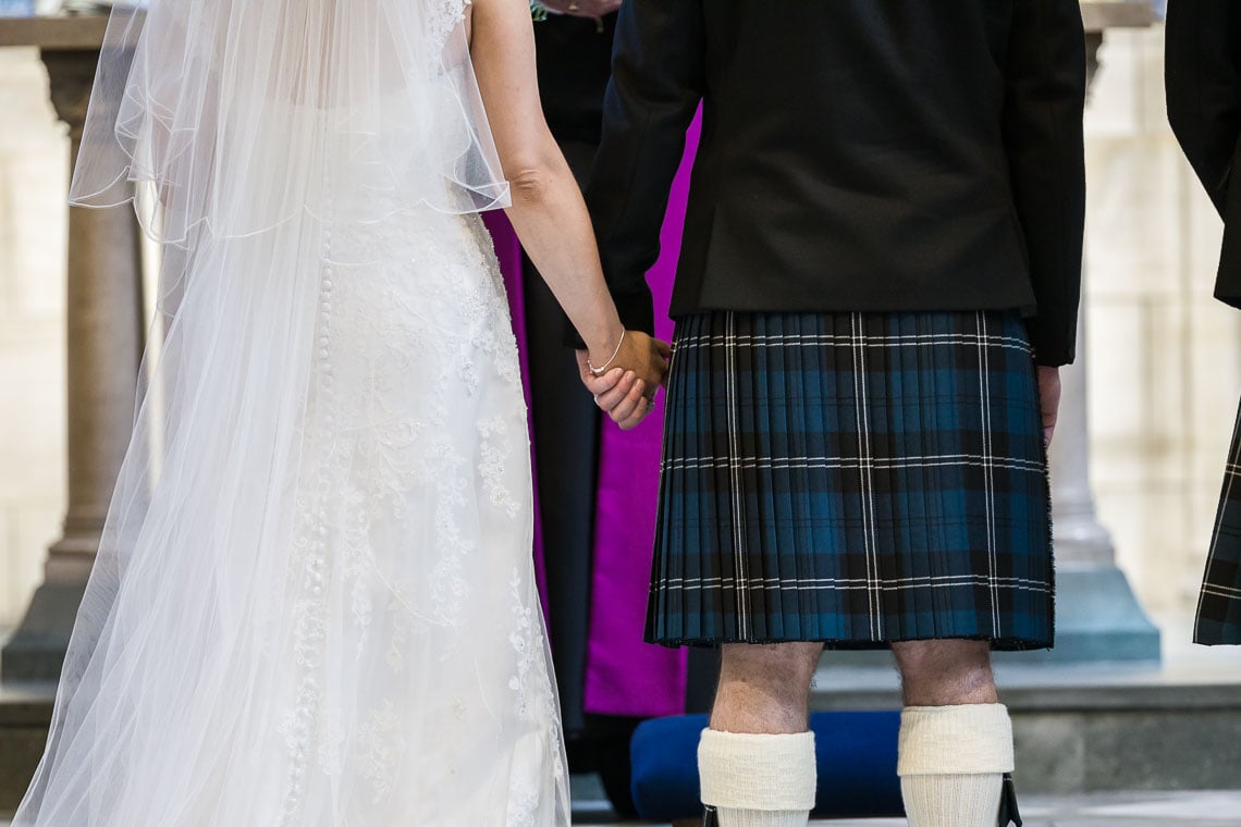 newlyweds holding hands