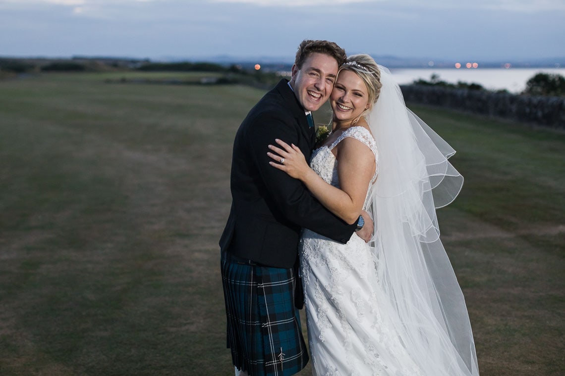 Fairmont St Andrews wedding newlyweds photo on the golf course at dusk