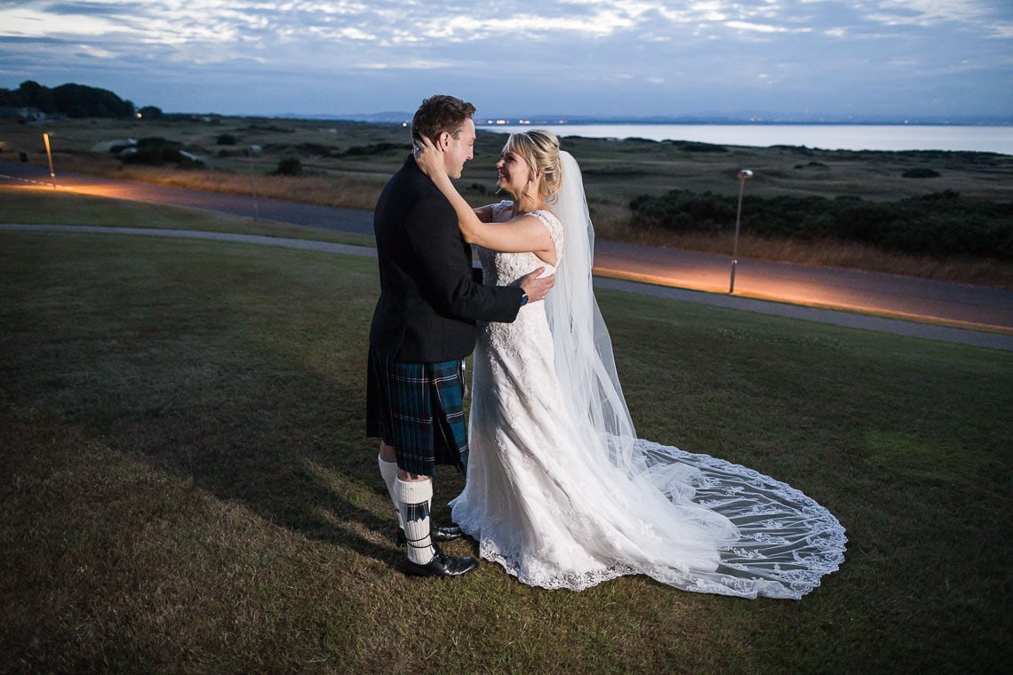 Fairmont St Andrews wedding newlyweds photo on the golf course at dusk