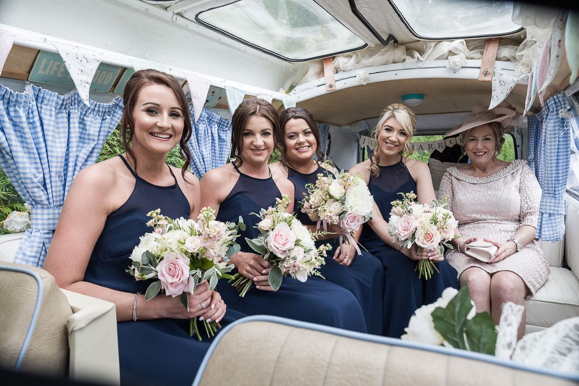 bridal party inside a classic VW camper van