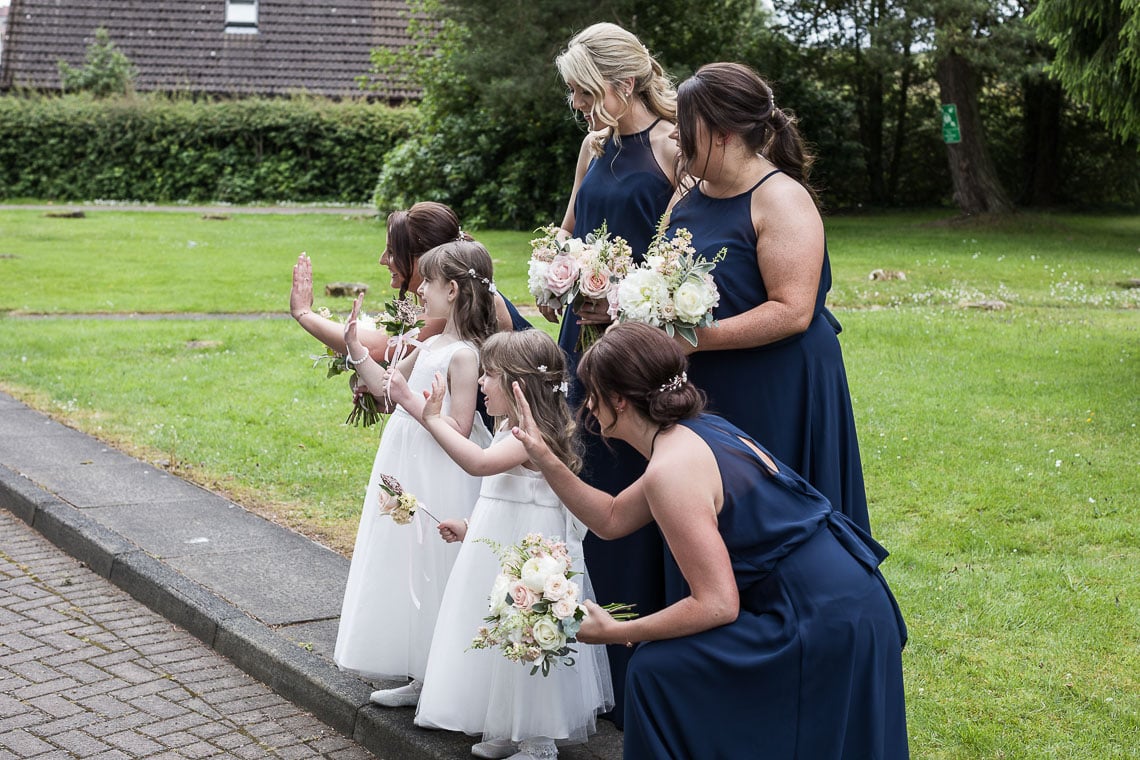 bridesmaids and flower girls waiting for the bride