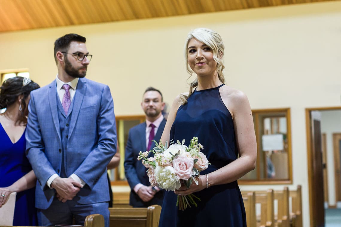 bridesmaid walking up the aisle