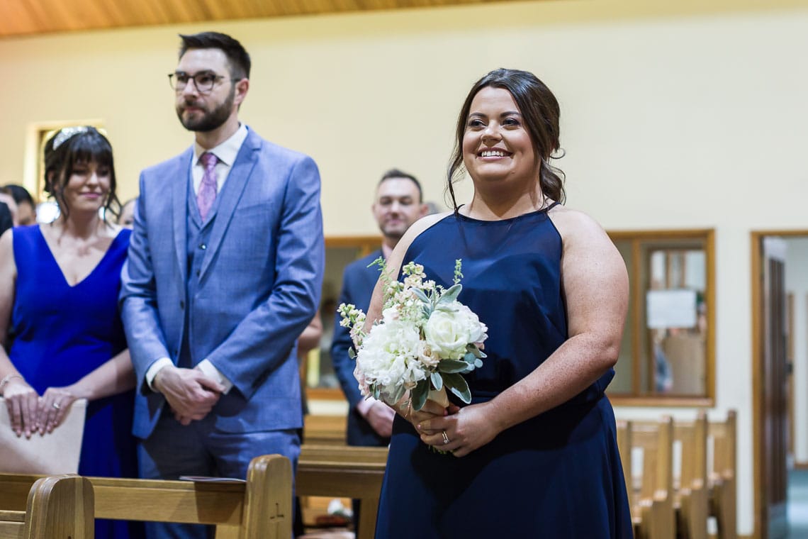 bridesmaid walking up the aisle