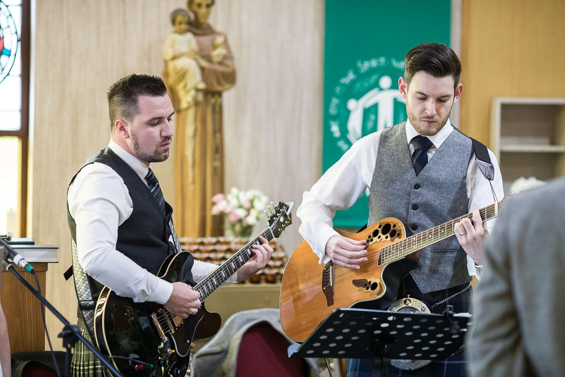 guitar players during hymns