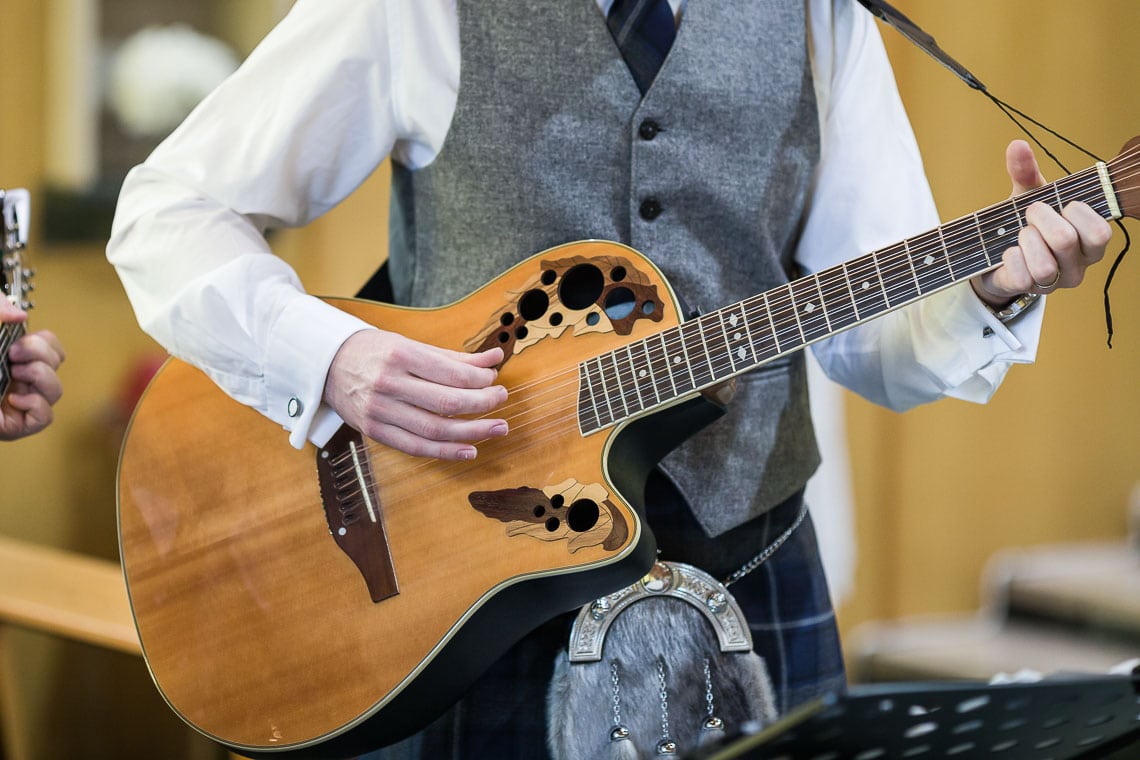 guitar player during hymns