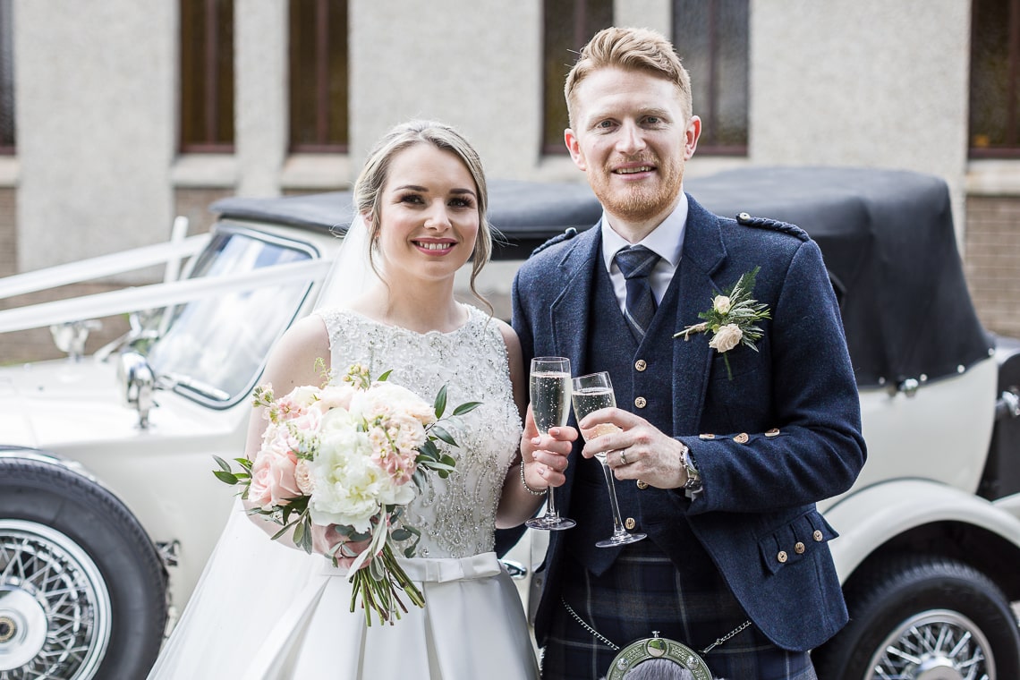 Newlyweds outside the church