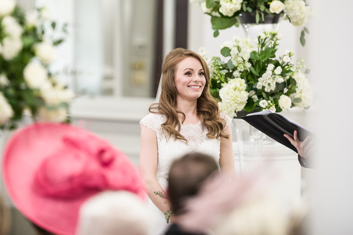 bride listening to the celebrant during Humanist ceremony in the King's Hall