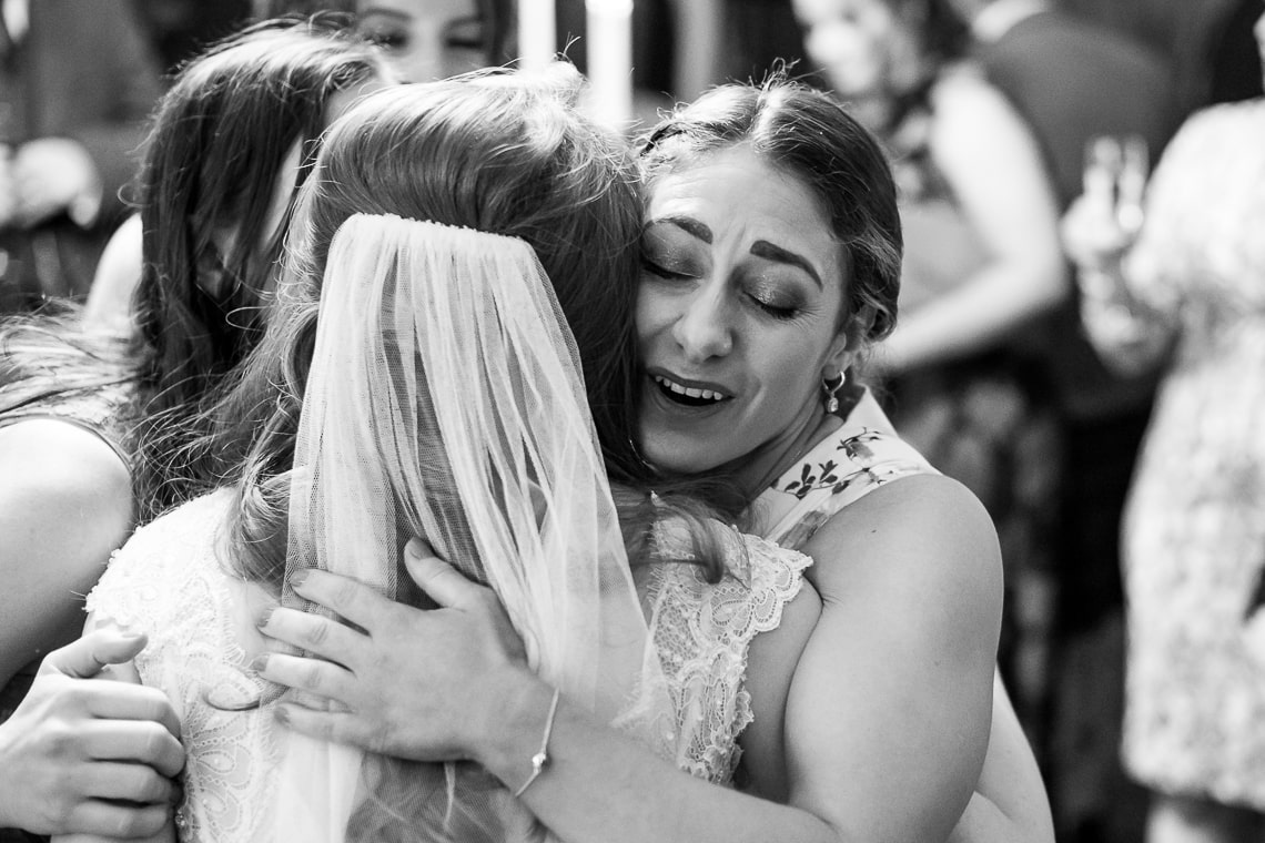 guest congratulating bride in the Library