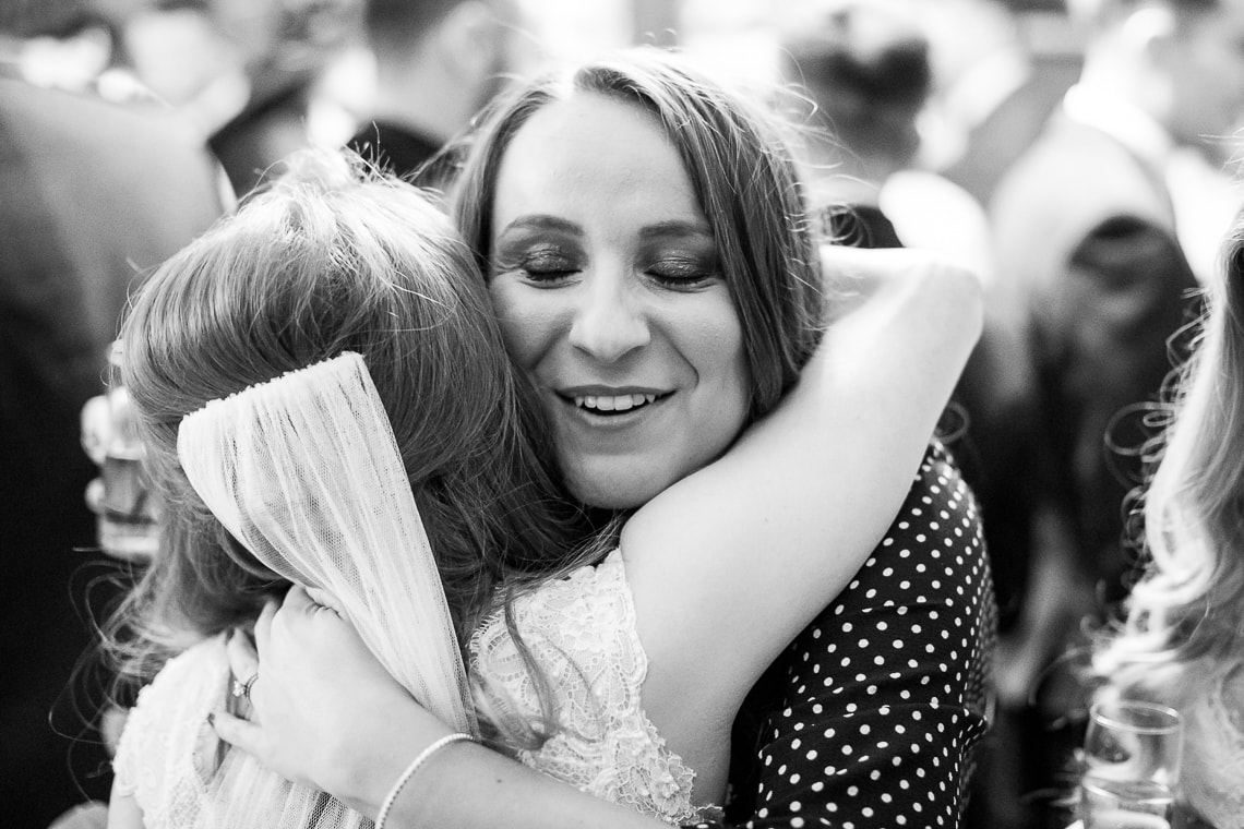 guest congratulating bride in the Library