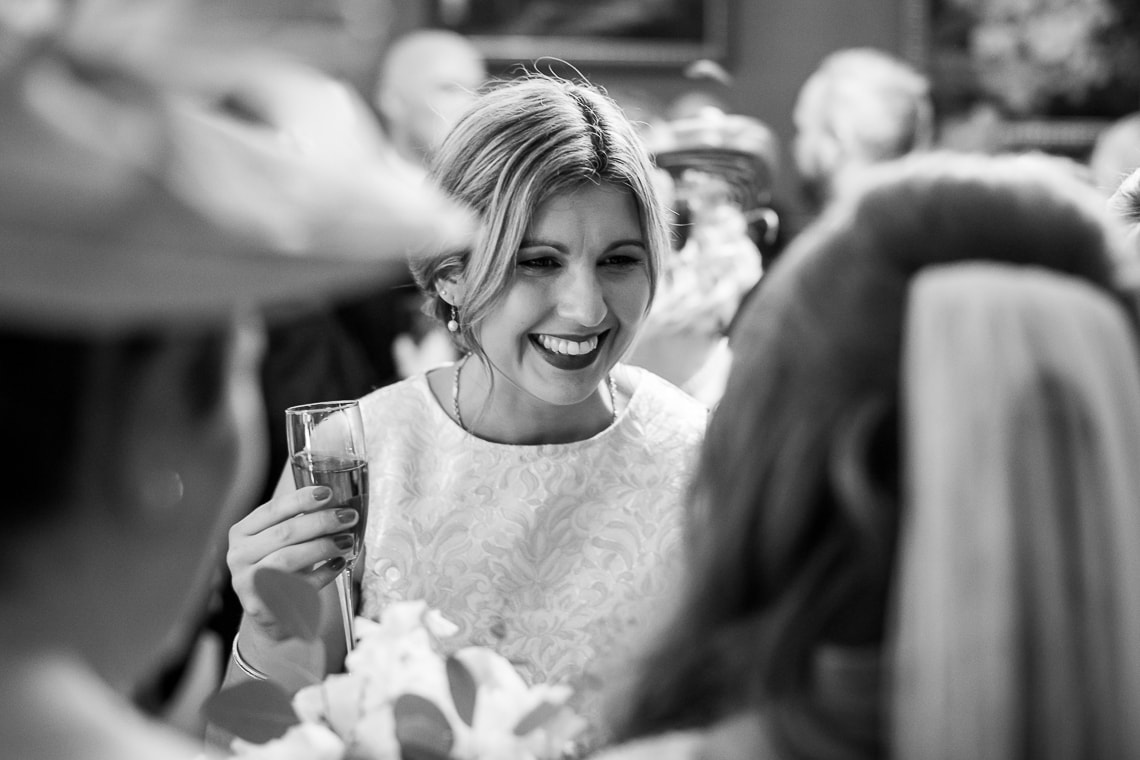 guest congratulating bride in the Library