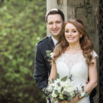newlyweds in Queen Street Gardens during their Edinburgh The George wedding day.