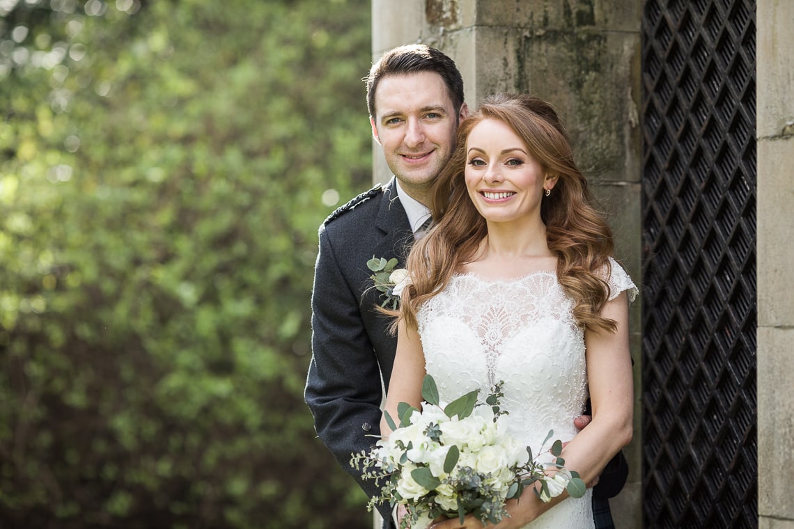 newlyweds in Queen Street Gardens during their Edinburgh The George wedding day.