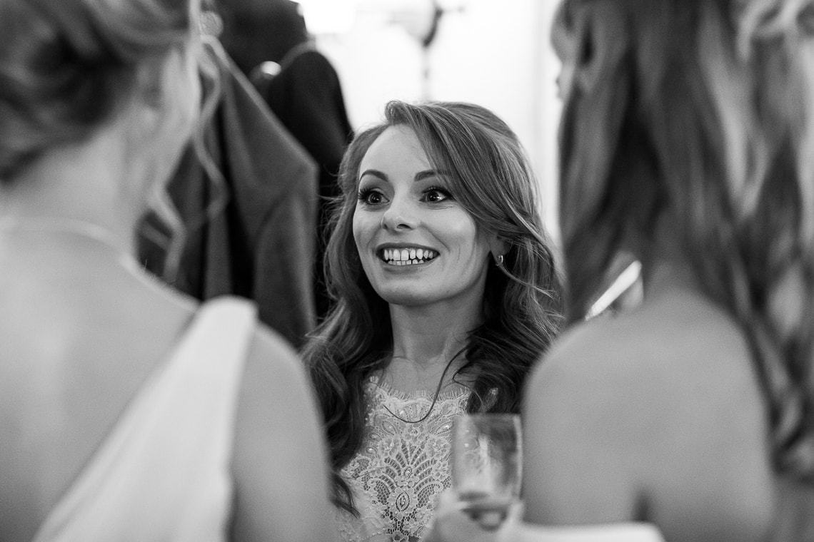 bride chatting with guests in the Library