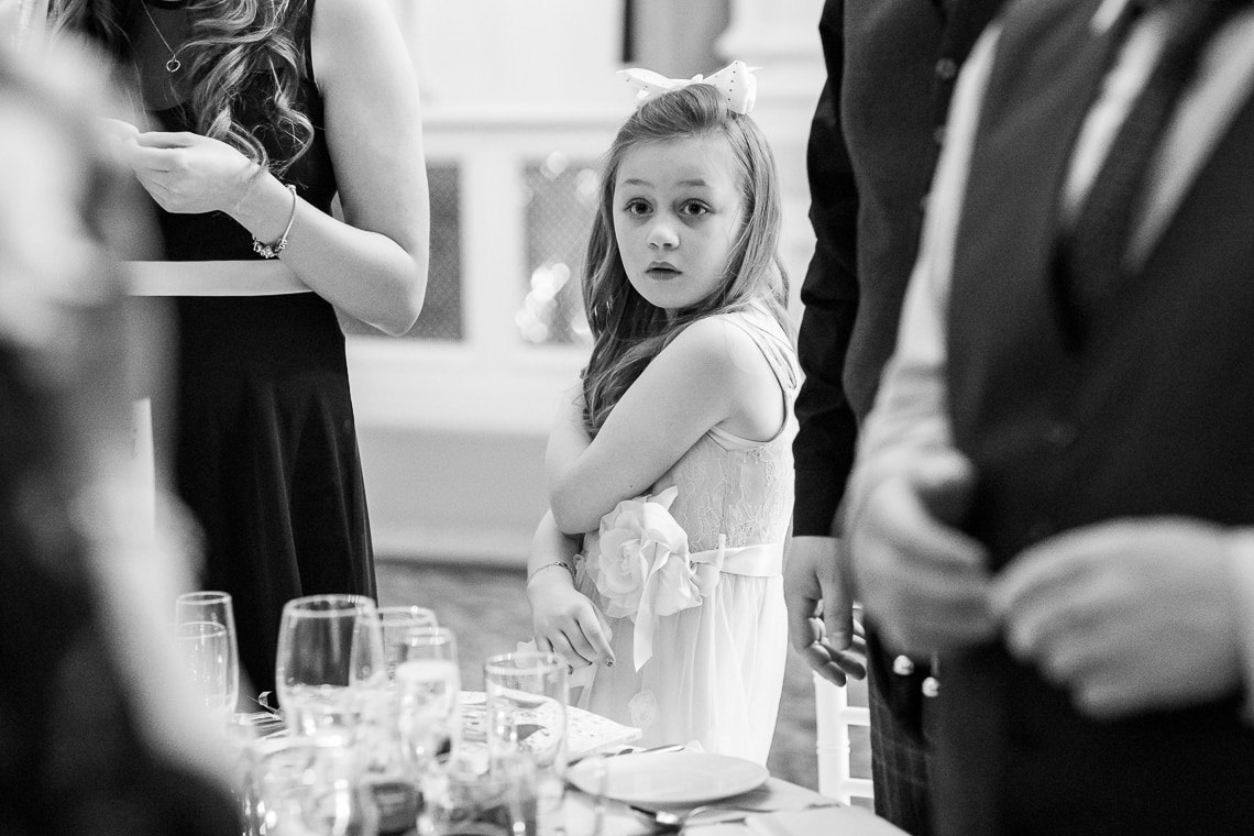 young guest watches King's Hall entry of the top table guests
