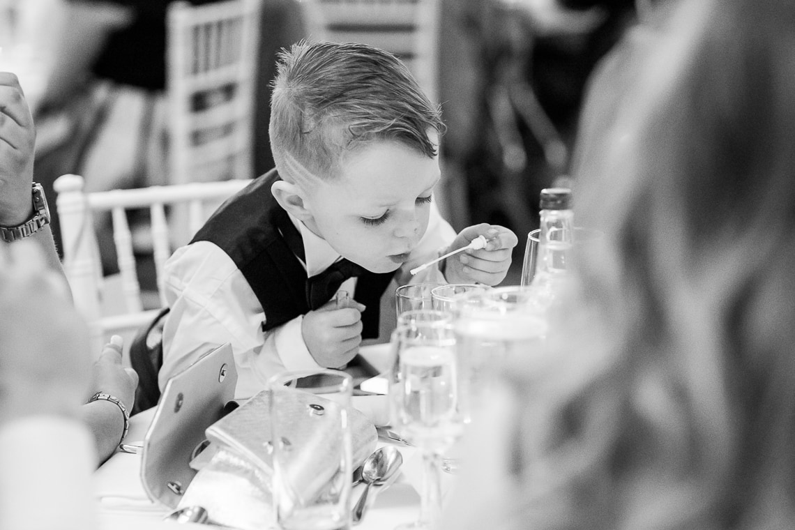 young guest checking out his gift