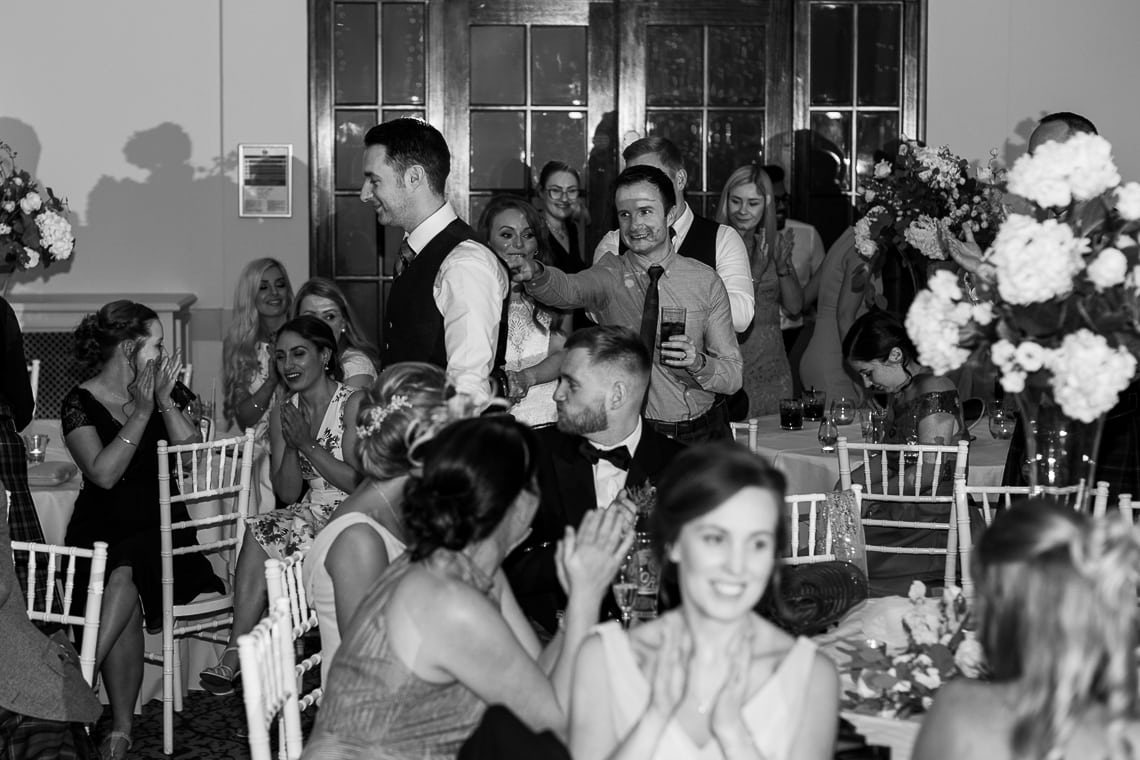newlyweds make their way into the King's Hall for the evening reception