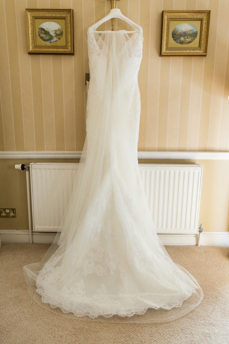 bride's dress hanging up