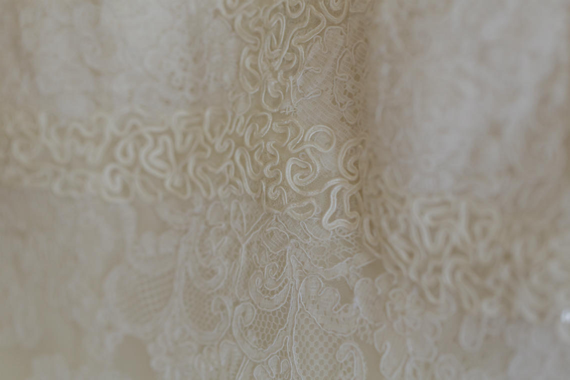 bride's dress detail photo