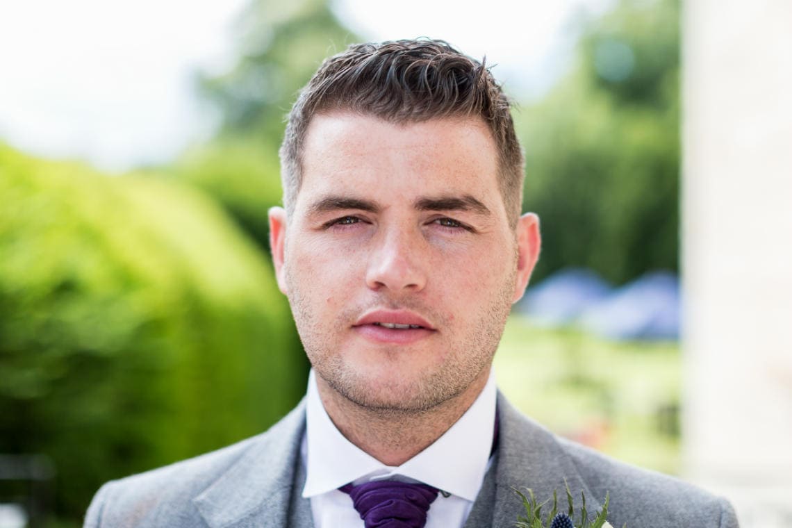 Groom Robert at the entrance