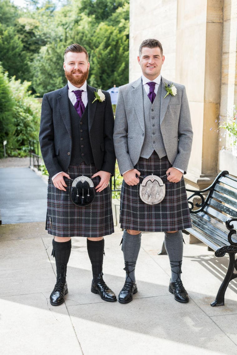 Groom and best man at the entrance