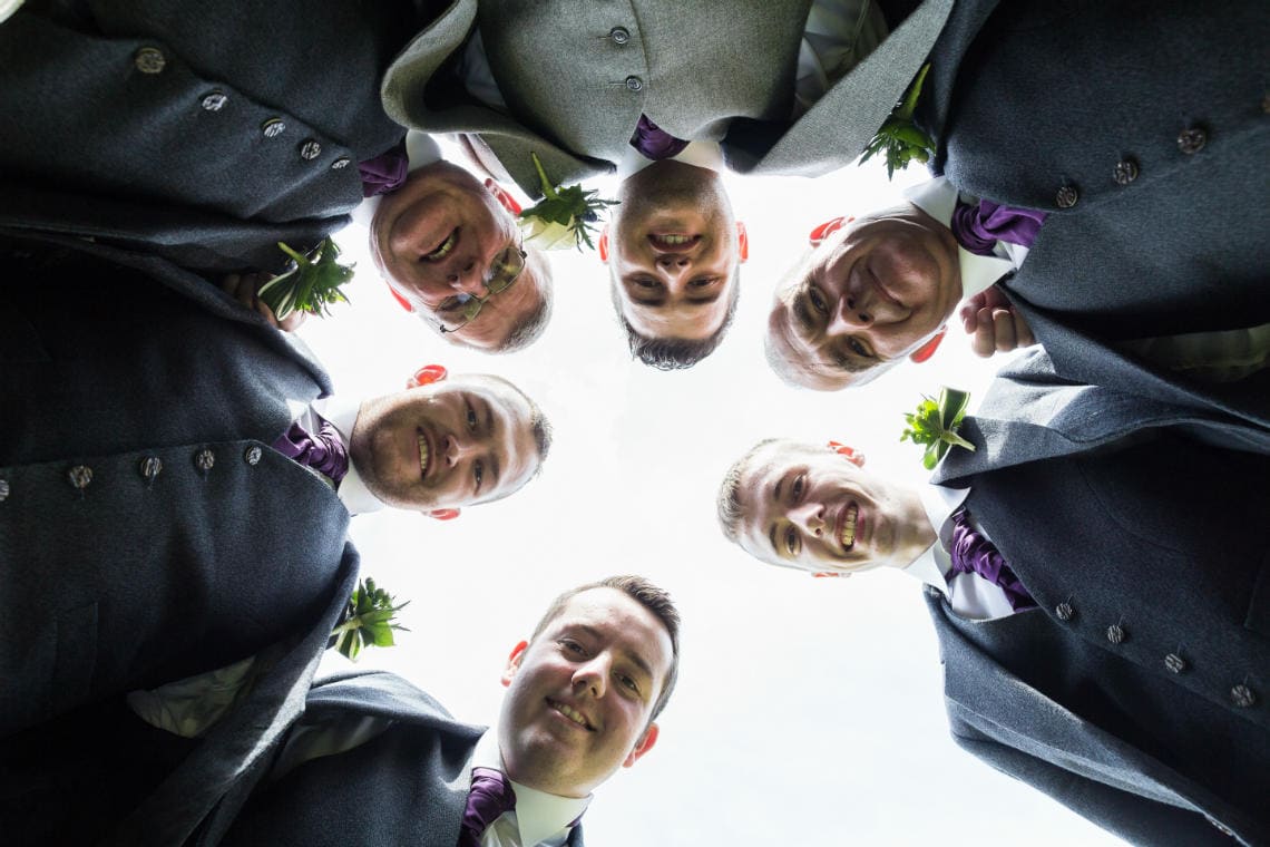 Groom and the boys huddle