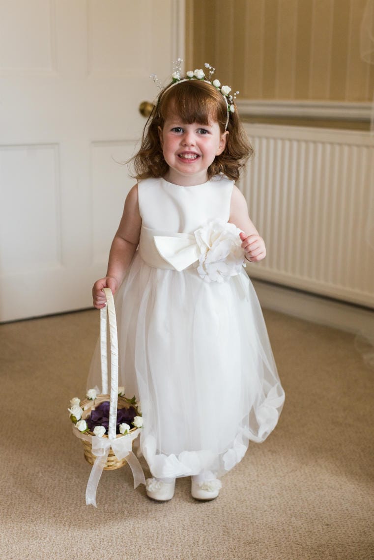 flower girl in white dress