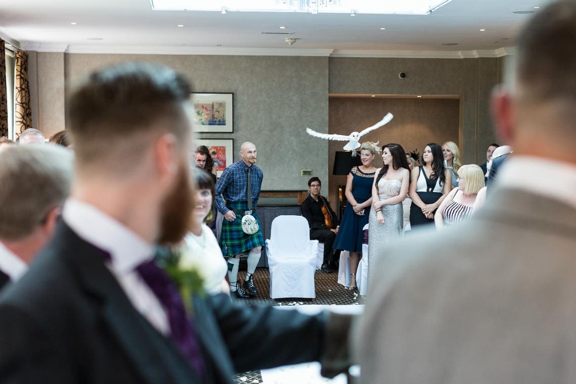 owl delivers the wedding rings in The Ballroom