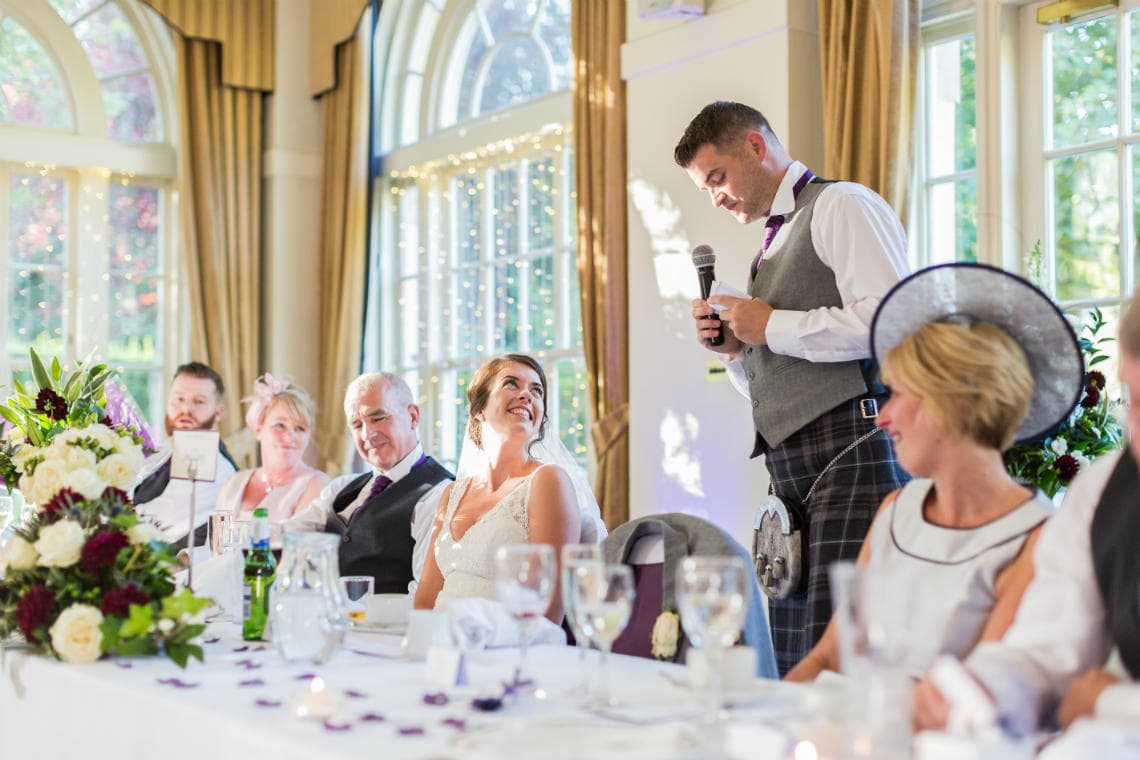 laughing during groom's speech