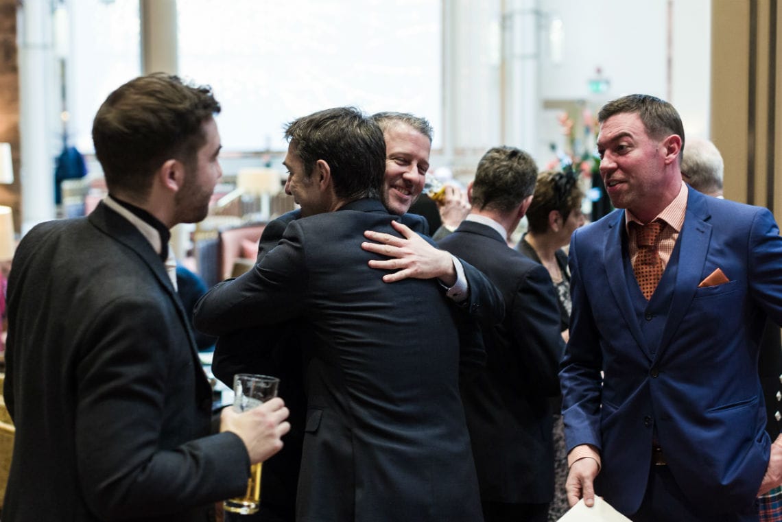 guests hugging each other