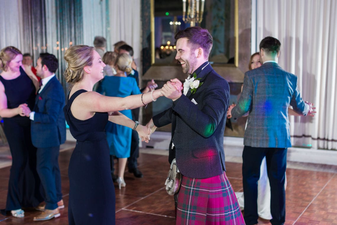 Guests dancing at evening reception