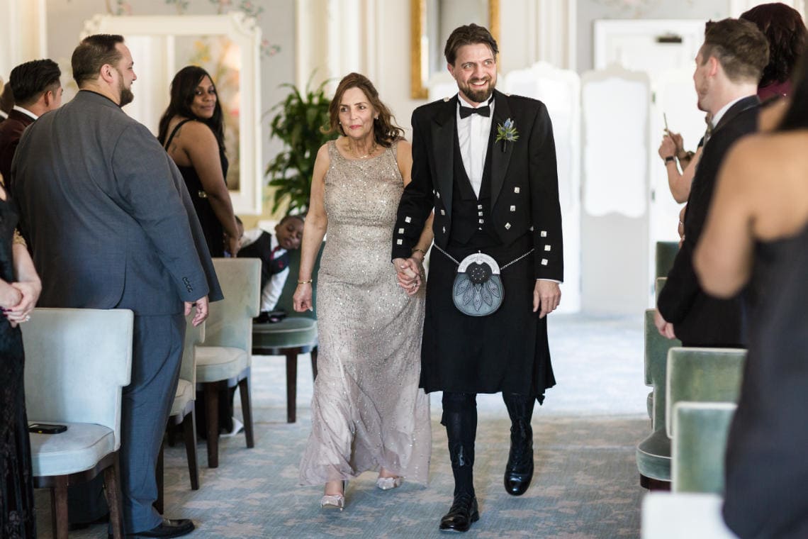 groom walking up the aisle at The Pompadour