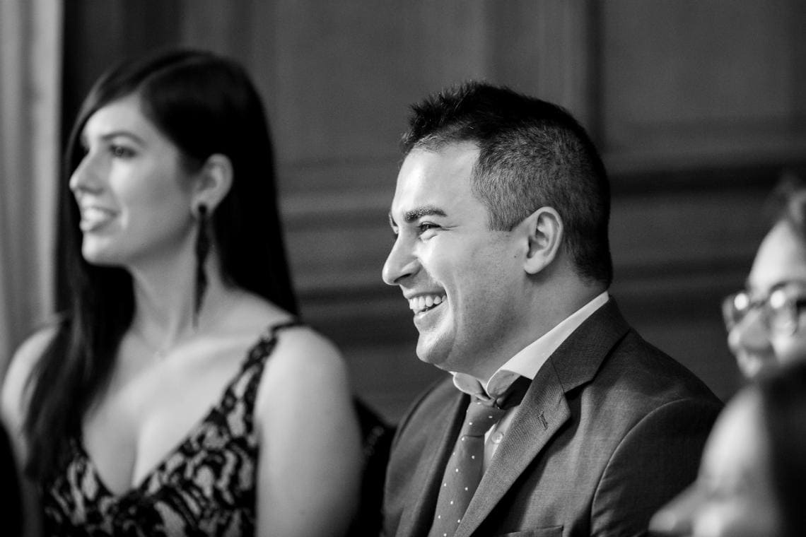 guest laughing during speeches in The Boardroom at The Caledonian Hotel Edinburgh